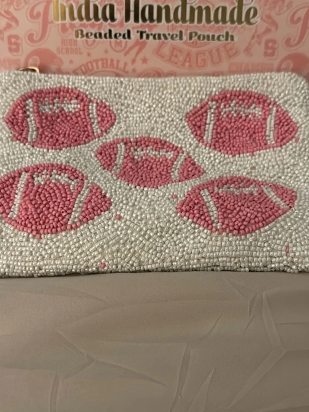 White Beaded Travel Pouch with Pink Football Motif